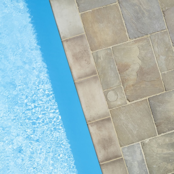 Raj tumbled paving and S+S pool copings Stoneworld 6