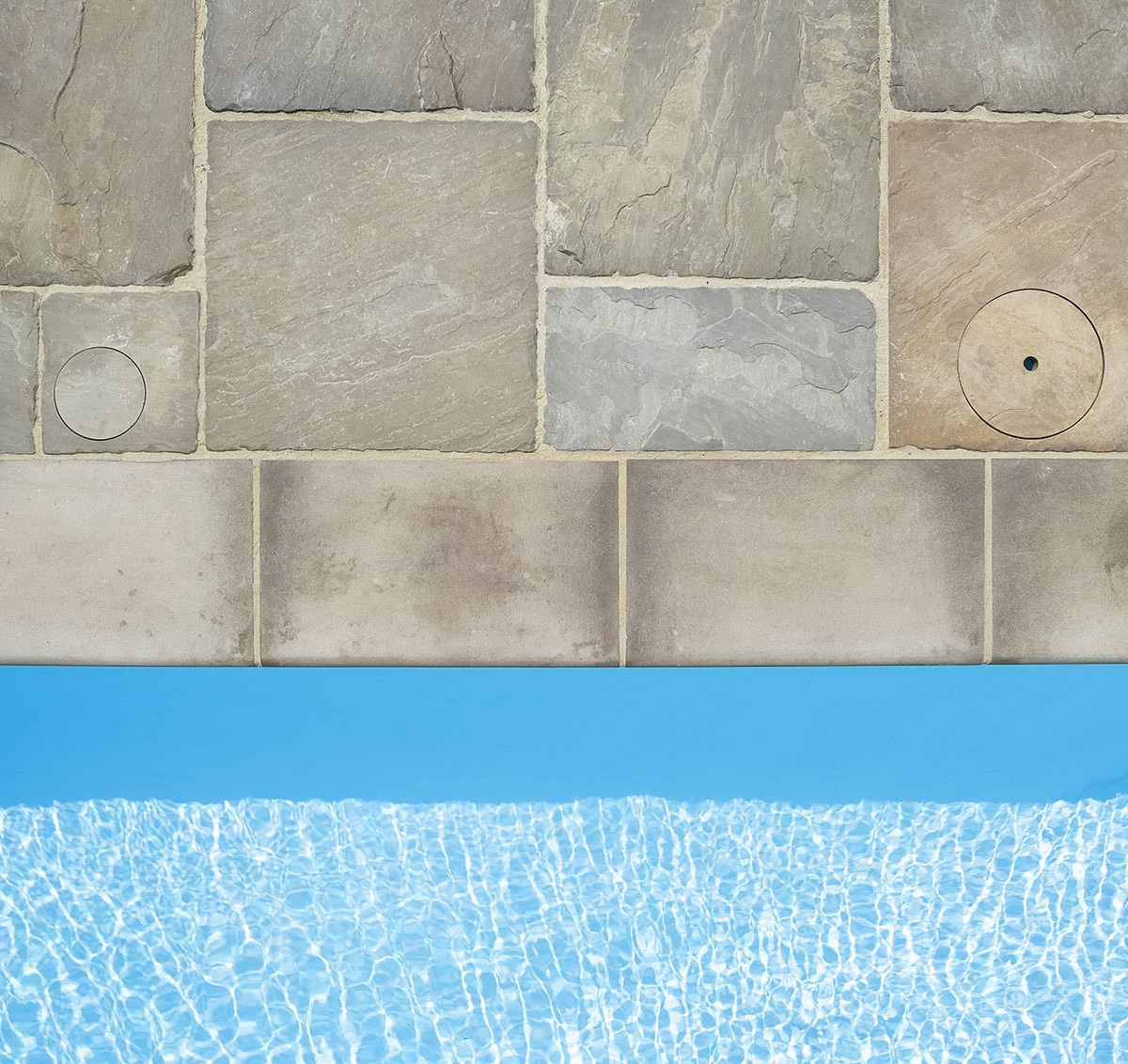 Raj tumbled paving and S+S pool copings Stoneworld 7