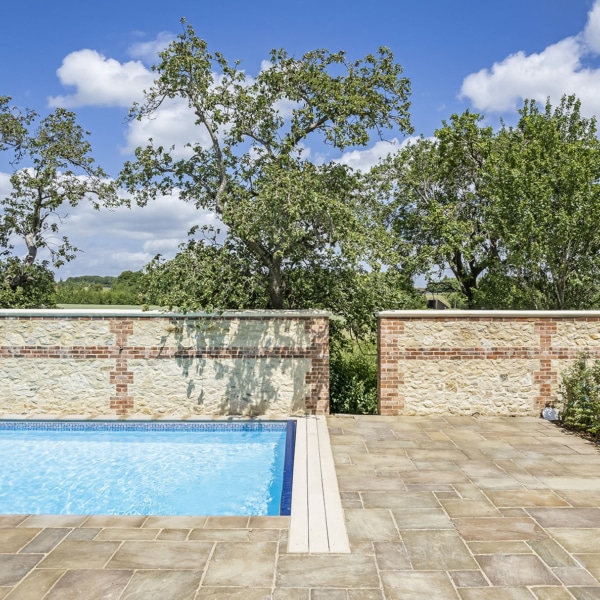 Raj tumbled paving and S+S pool copings Stoneworld 9