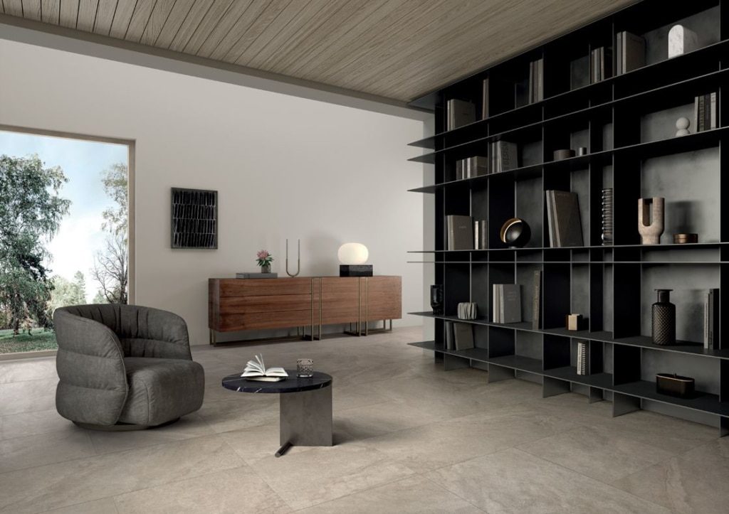 Italian porcelain floor tiles laid in a contemporary interior with shelving and furniture