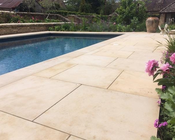 Yellow Mint honed sandstone paving and pool copings