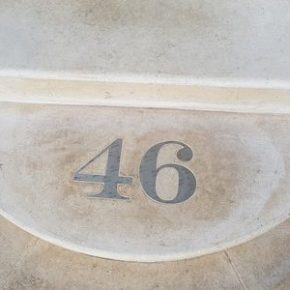 Elegant Bath stone steps with an inlaid number, designed and installed by Stoneworld Oxfordshire.