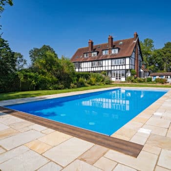 natural stone pool copings in landscape