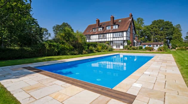 natural stone pool copings in landscape