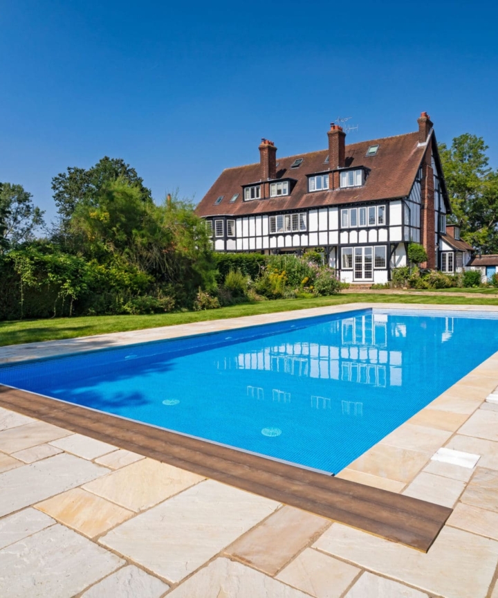 natural stone pool copings in landscape