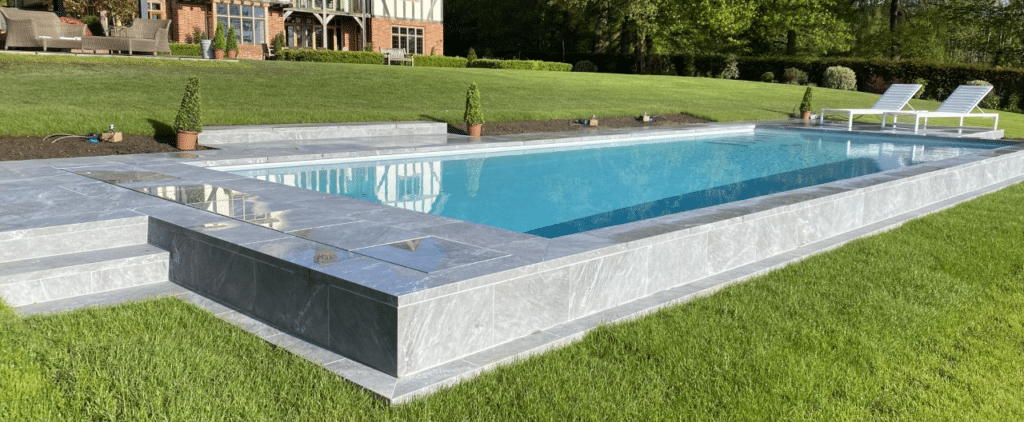 Porcelain pool copings and paving project