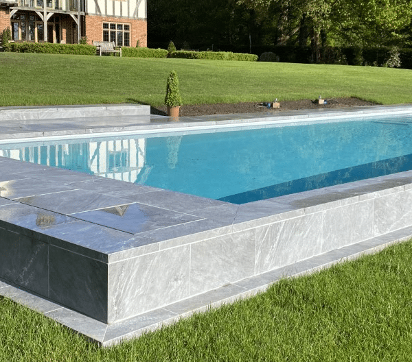 Porcelain pool copings and paving project